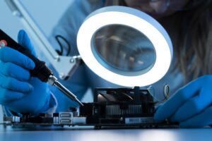 close-up-researcher-working-with-lamp